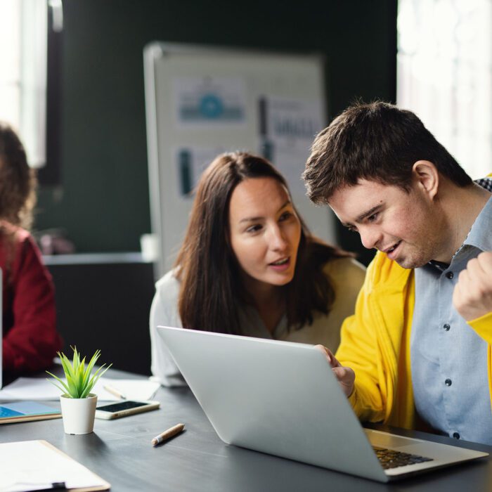 Down-syndrome man attending education class